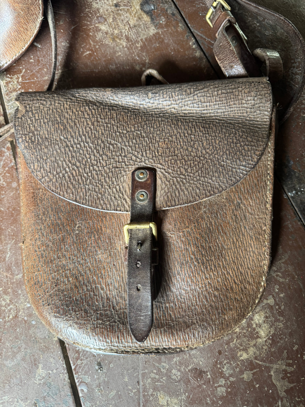 A pair of early 20th century leather despatch-type shoulder bags with original straps