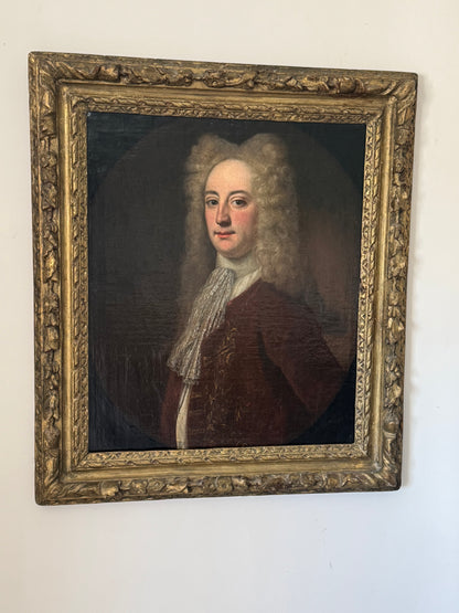 A fine early 18th century portrait of a gentleman in a crimson coat, circle of Joseph Highmore (1692-1780)