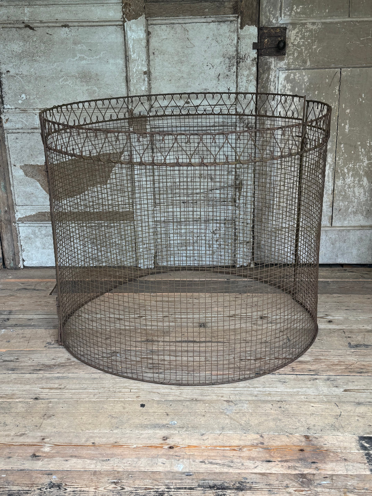 A mid century wire tree guard