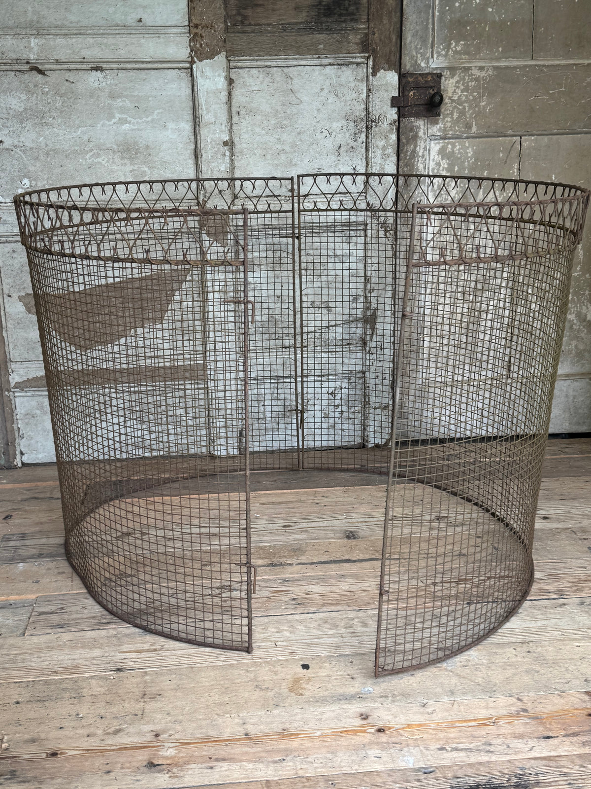 A mid century wire tree guard