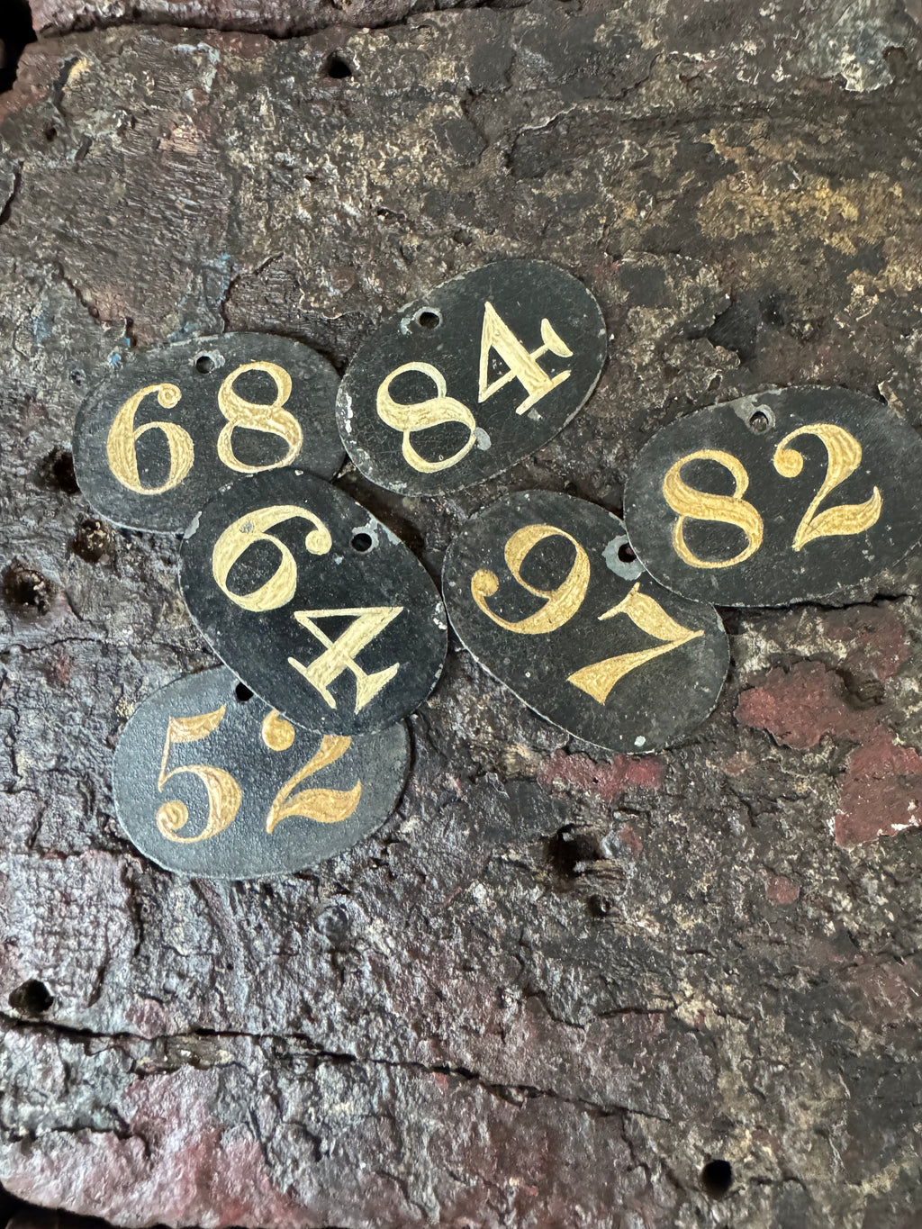 A group of six small early 19th century tole bin labels