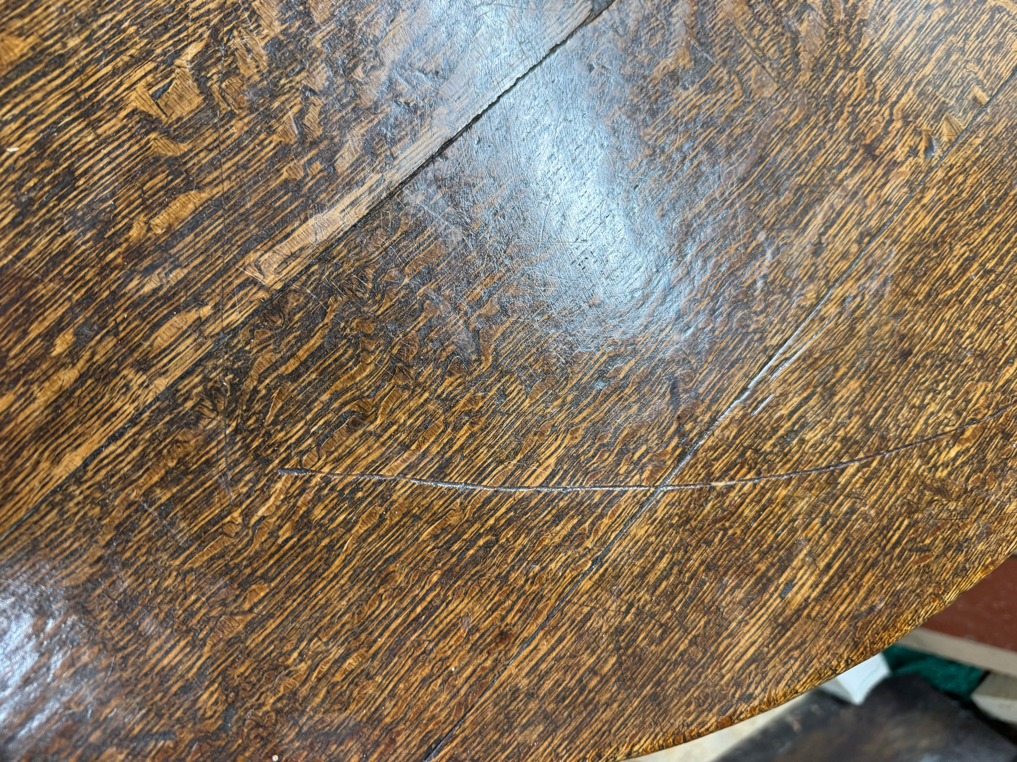 An  early 19th century Welsh oak cricket table of good colour