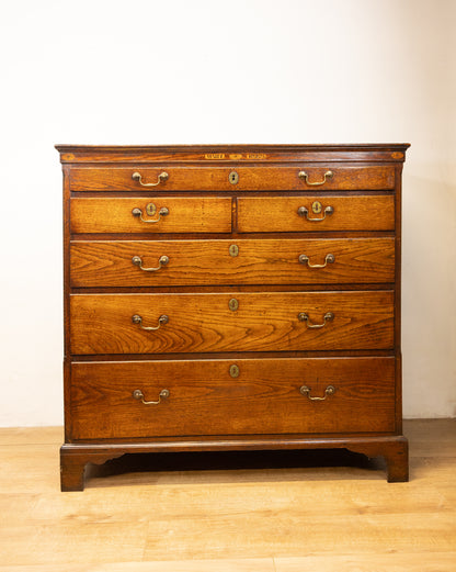 An unusual George III oak North Country oak chest of drawers with inset name 'Mary Rees'