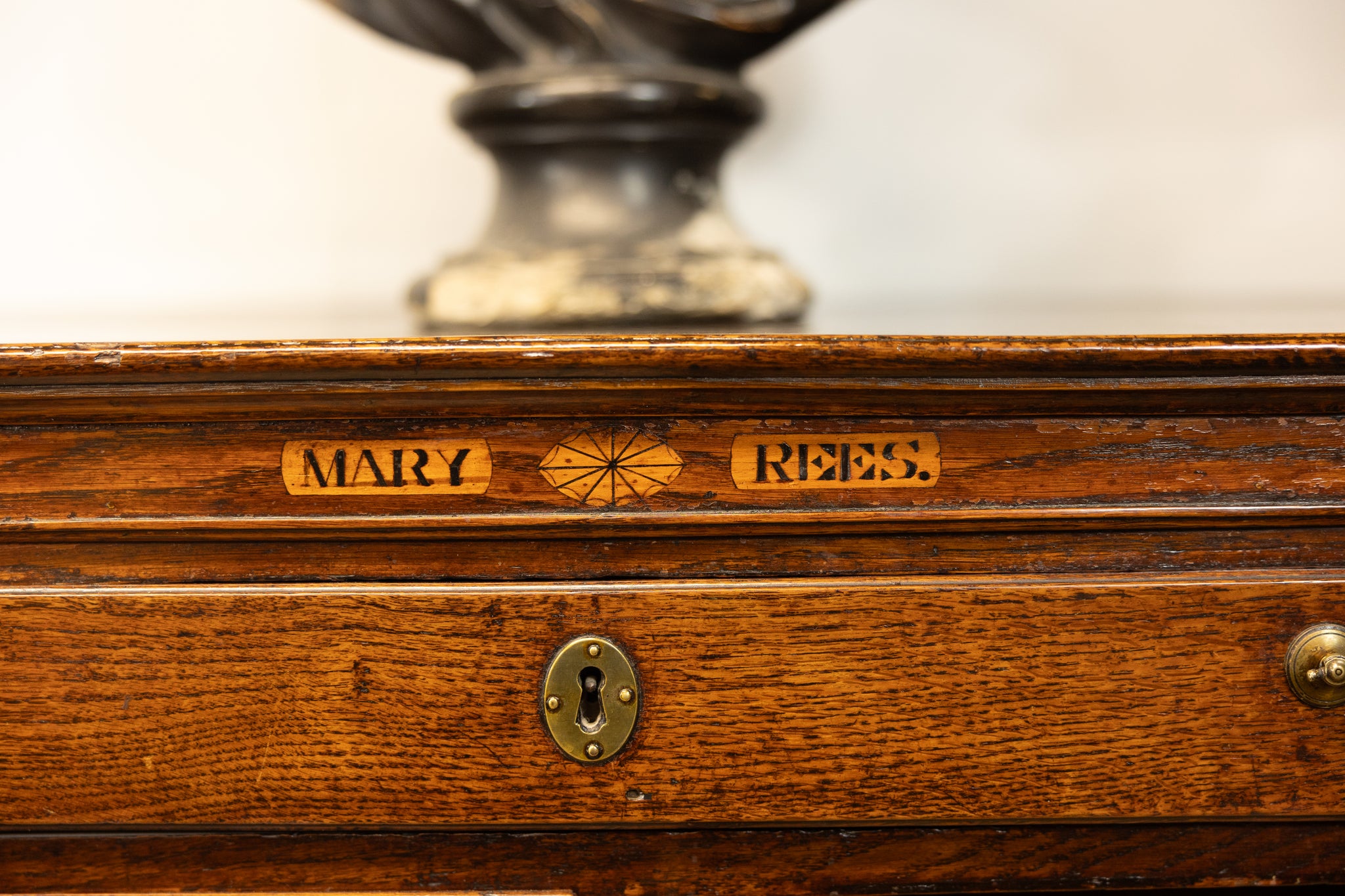 An unusual George III oak North Country oak chest of drawers with inset name 'Mary Rees'