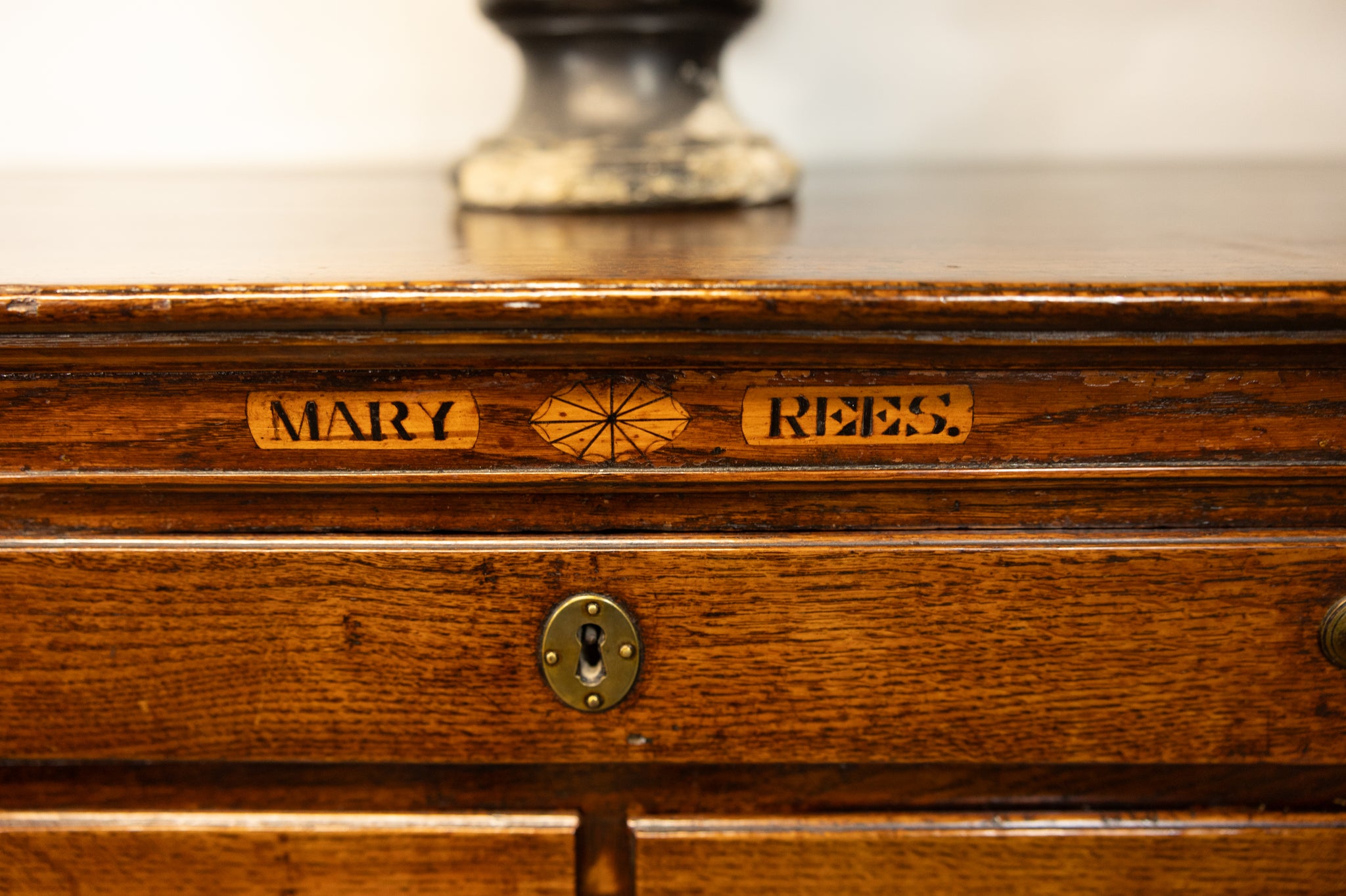 An unusual George III oak North Country oak chest of drawers with inset name 'Mary Rees'