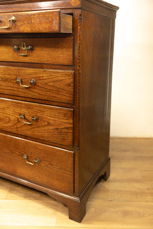 An unusual George III oak North Country oak chest of drawers with inset name 'Mary Rees'