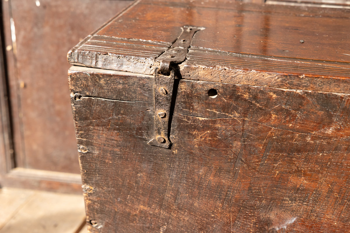 An  Elizabethan carved oak boarded chest with winged fantastic beasts, english, probably West Country, circa 1570–90