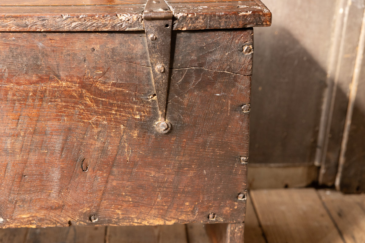 An  Elizabethan carved oak boarded chest with winged fantastic beasts, english, probably West Country, circa 1570–90