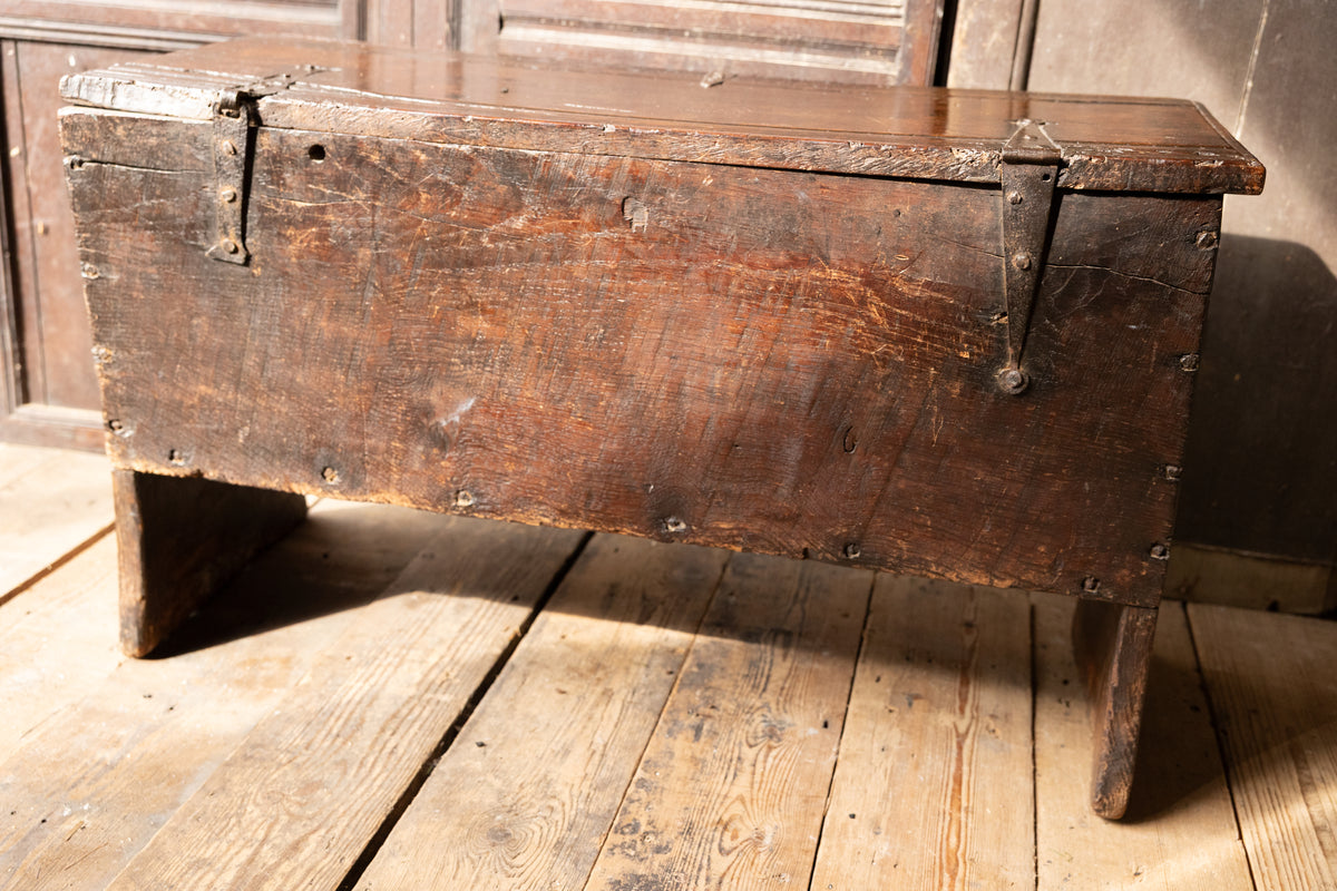 An  Elizabethan carved oak boarded chest with winged fantastic beasts, english, probably West Country, circa 1570–90