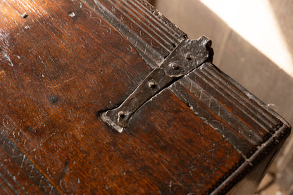 An  Elizabethan carved oak boarded chest with winged fantastic beasts, english, probably West Country, circa 1570–90