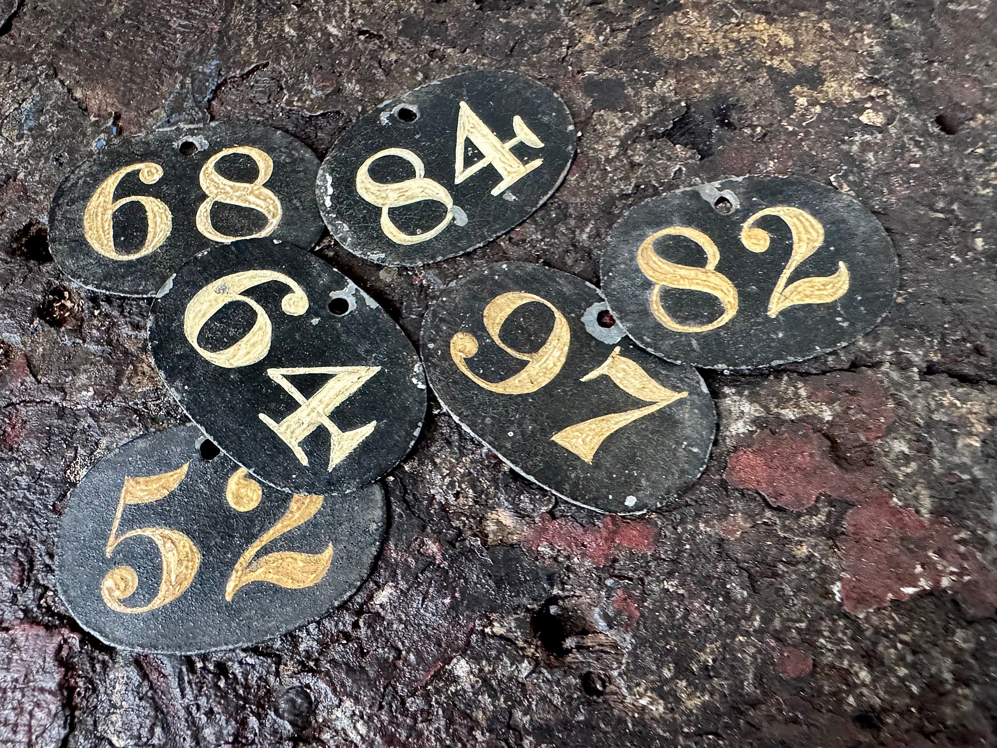A group of six small early 19th century tole bin labels