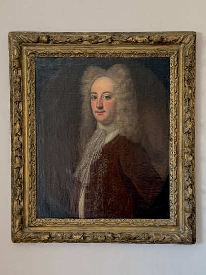 A fine early 18th century portrait of a gentleman in a crimson coat, circle of Joseph Highmore (1692-1780)