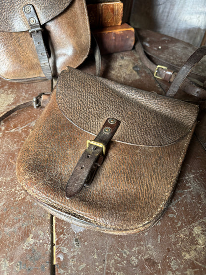 A pair of early 20th century leather despatch-type shoulder bags with original straps