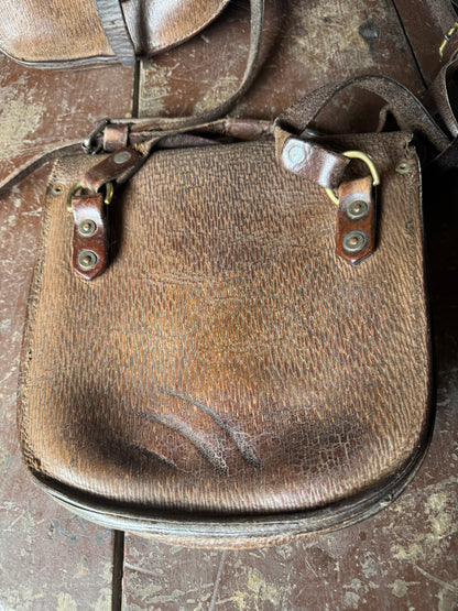 A pair of early 20th century leather despatch-type shoulder bags with original straps