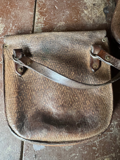 A pair of early 20th century leather despatch-type shoulder bags with original straps