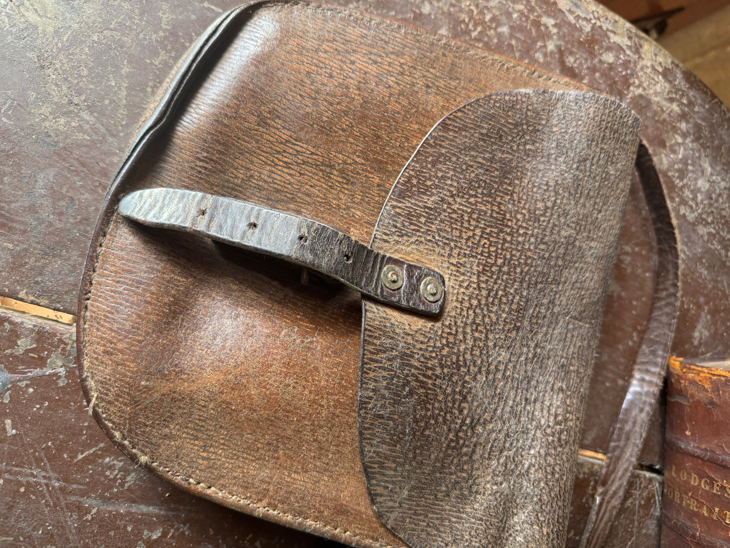 A pair of early 20th century leather despatch-type shoulder bags with original straps