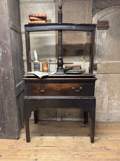 A provincial George III linen press with screw mechanism