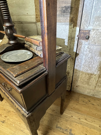 A provincial George III linen press with screw mechanism