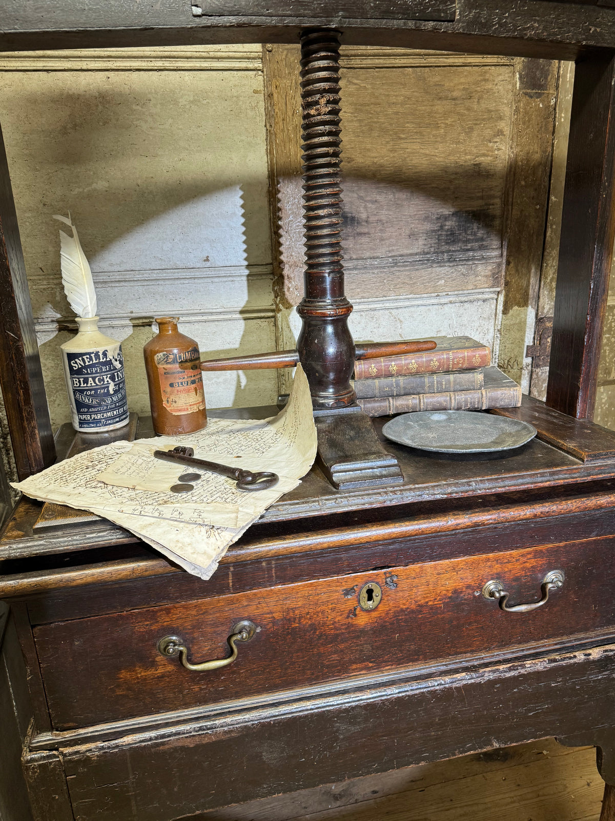 A provincial George III linen press with screw mechanism