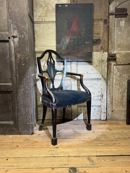 A late 18th-century George III painted open armchair with unusual block feet