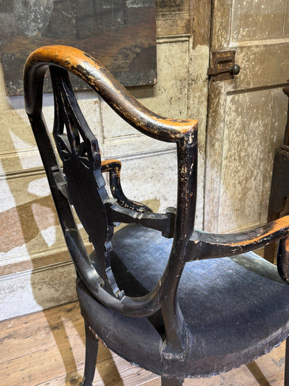 A late 18th-century George III painted open armchair with unusual block feet