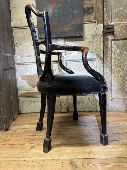 A late 18th-century George III painted open armchair with unusual block feet