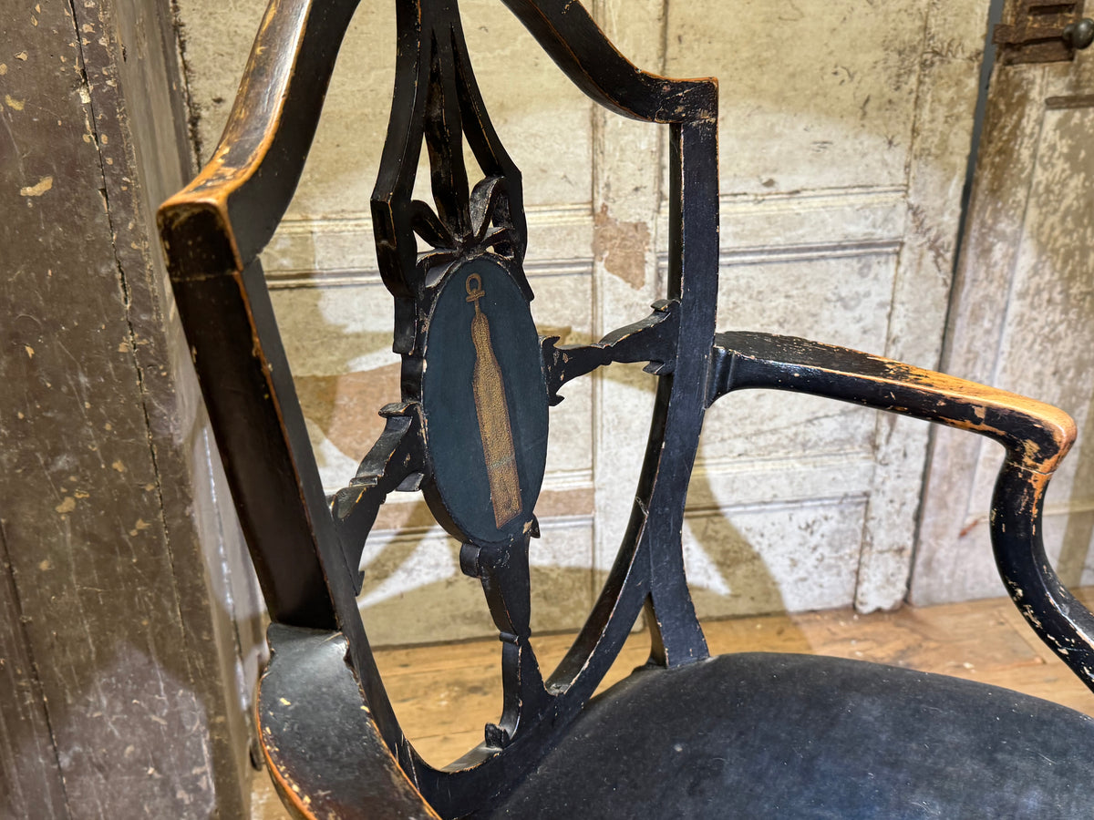 A late 18th-century George III painted open armchair with unusual block feet