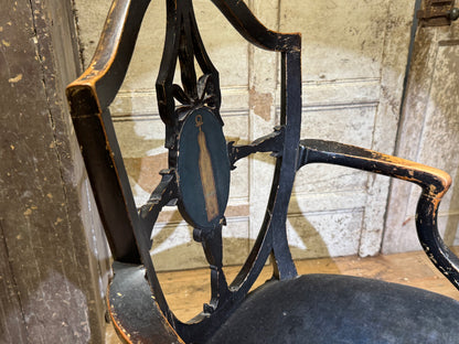 A late 18th-century George III painted open armchair with unusual block feet