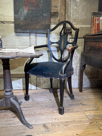 A late 18th-century George III painted open armchair with unusual block feet