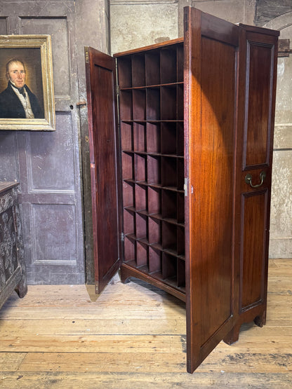 A slender Regency mahogany estate cabinet by repute from a Cambridge university college