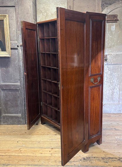 A slender Regency mahogany estate cabinet by repute from a Cambridge university college