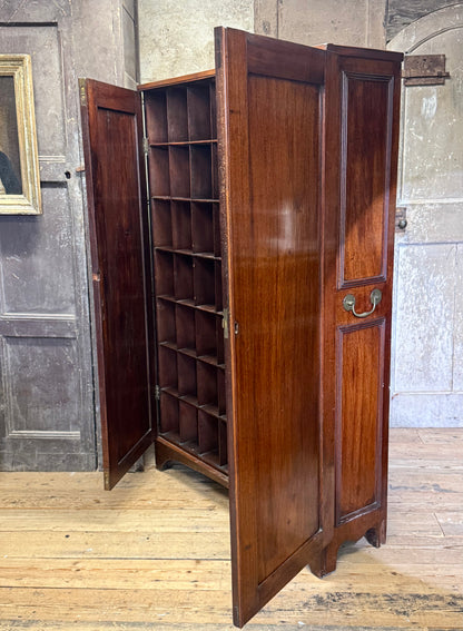 A slender Regency mahogany estate cabinet by repute from a Cambridge university college