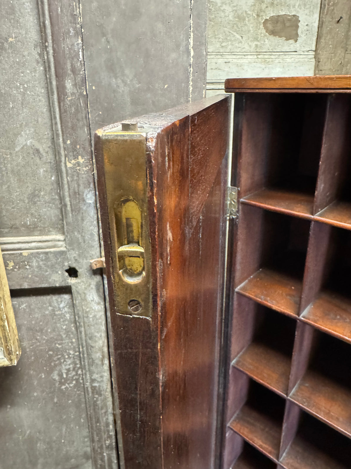 A slender Regency mahogany estate cabinet by repute from a Cambridge university college