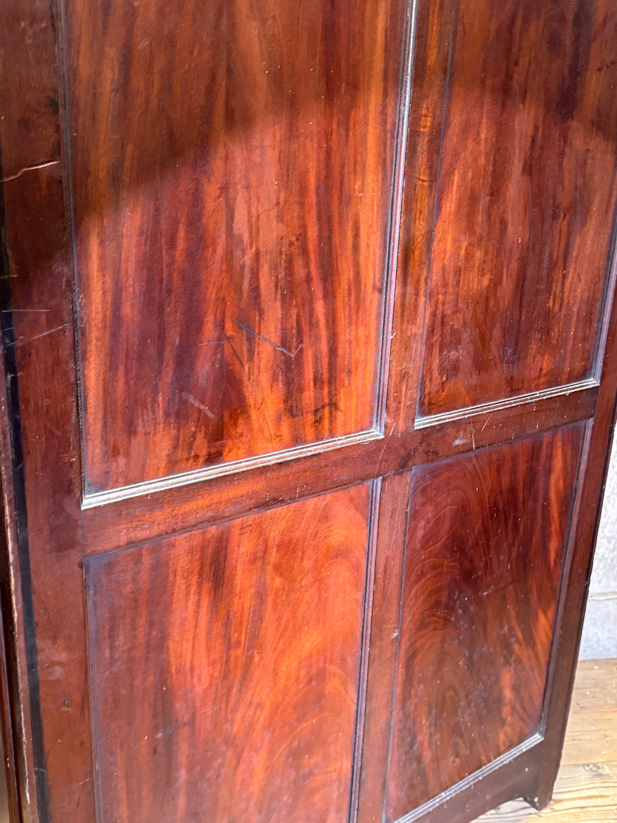 A slender Regency mahogany estate cabinet by repute from a Cambridge university college
