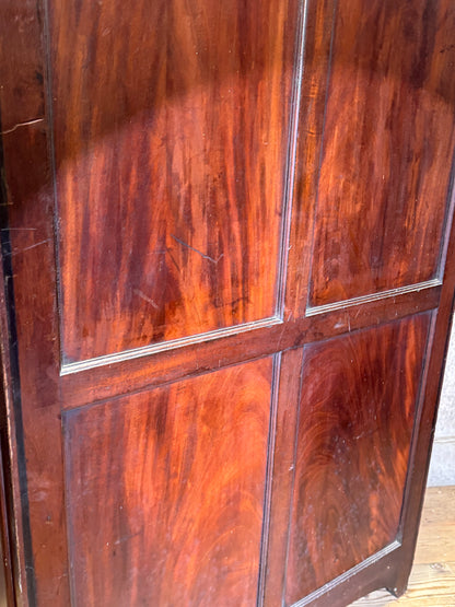 A slender Regency mahogany estate cabinet by repute from a Cambridge university college