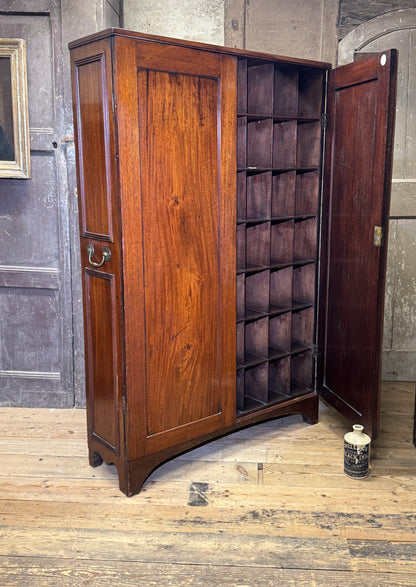 A slender Regency mahogany estate cabinet by repute from a Cambridge university college