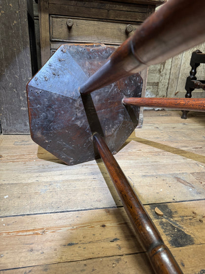 A George III primitive oak slab top octagonal cricket table of exceptional colour