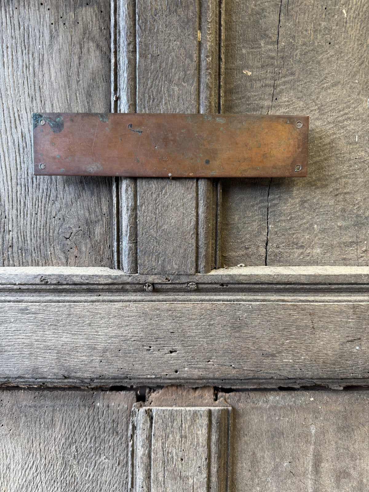 An early 20th century English 'Enquiries' brass door sign