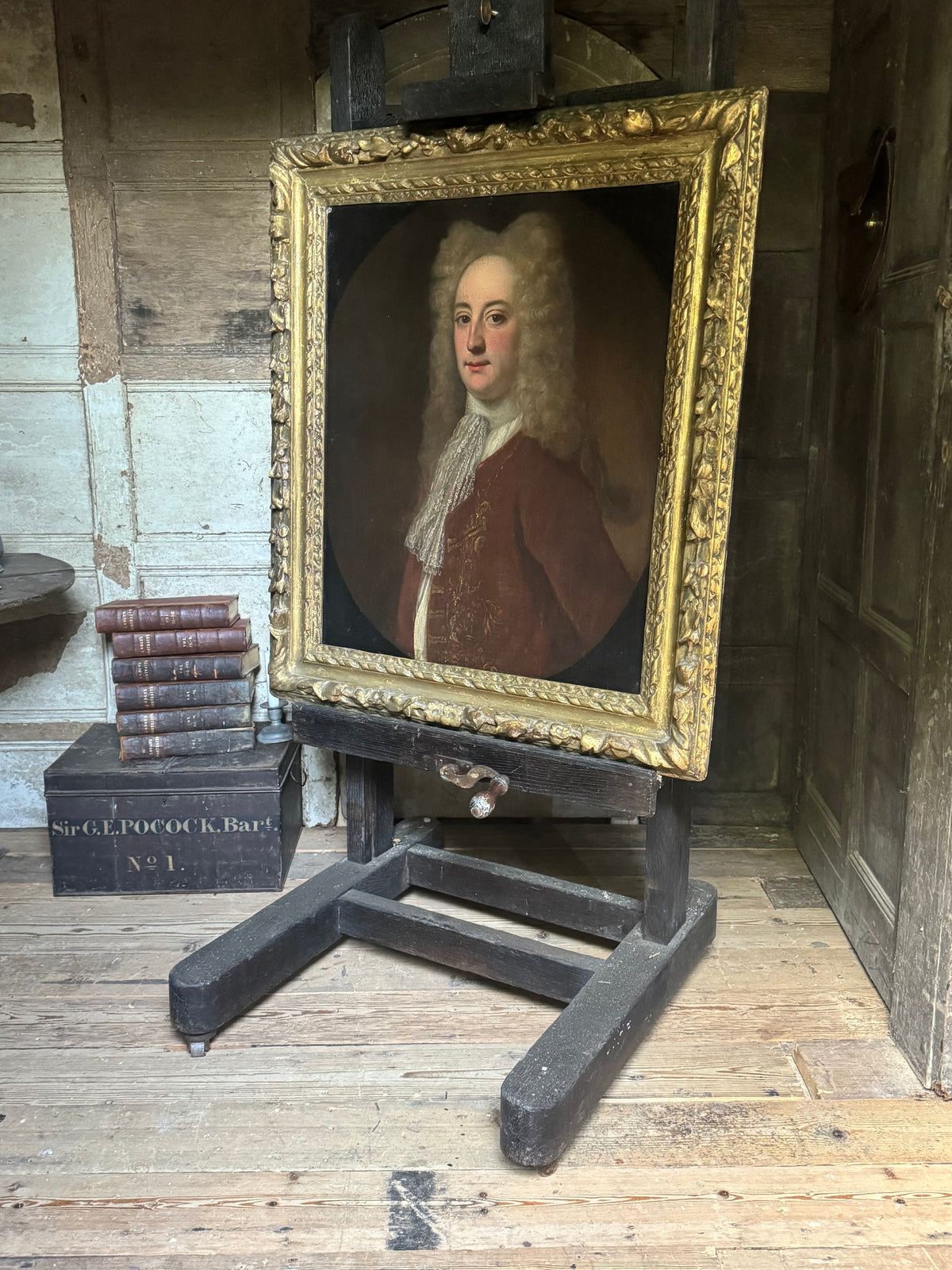 A fine early 18th century portrait of a gentleman in a crimson coat, circle of Joseph Highmore (1692-1780)
