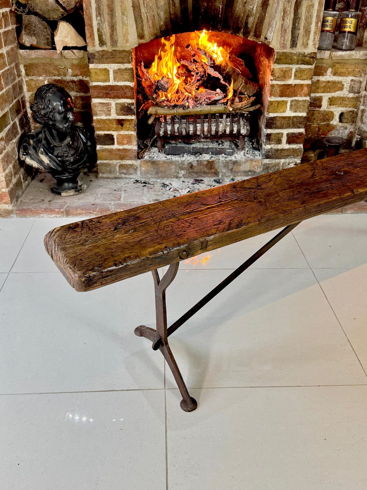 A good 'Air Ministry' Bench with cast iron legs dating to 1925 standing at six feet long