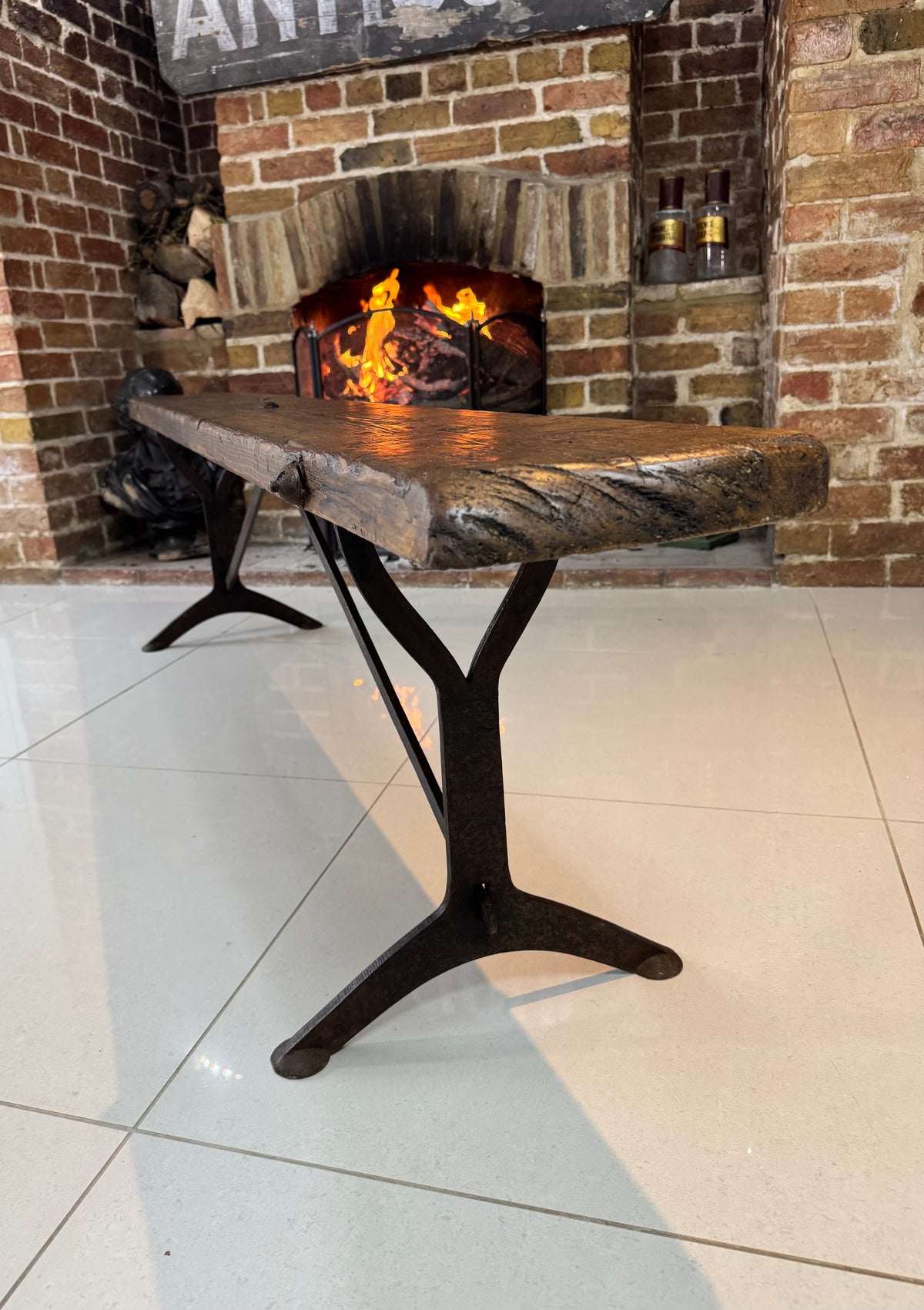 A good 'Air Ministry' Bench with cast iron legs dating to 1925 standing at six feet long