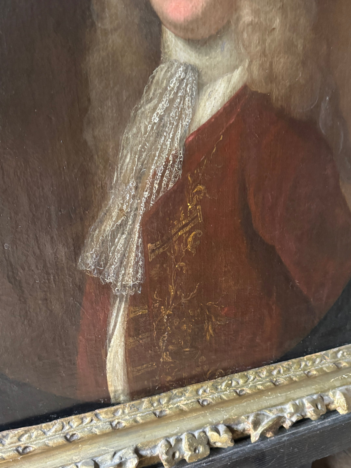 A fine early 18th century portrait of a gentleman in a crimson coat, circle of Joseph Highmore (1692-1780)