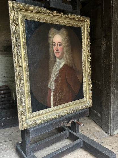 A fine early 18th century portrait of a gentleman in a crimson coat, circle of Joseph Highmore (1692-1780)