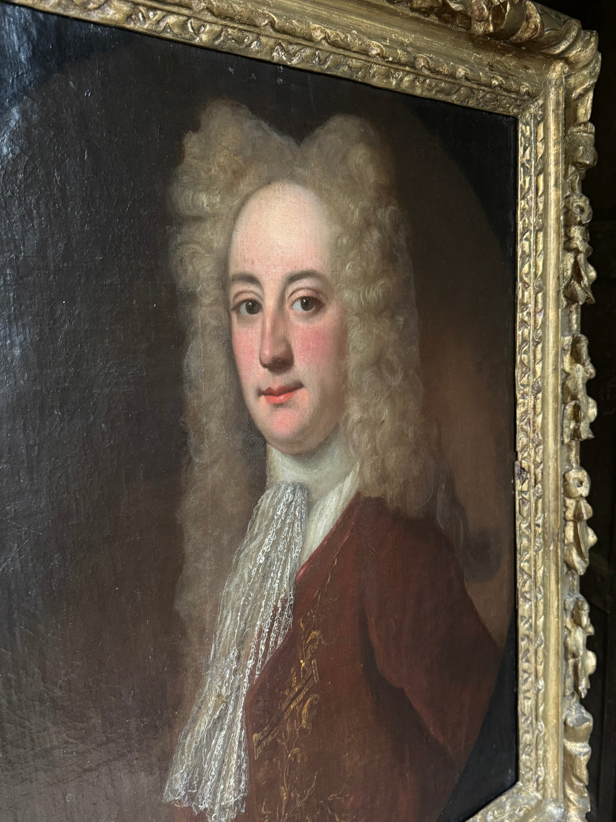 A fine early 18th century portrait of a gentleman in a crimson coat, circle of Joseph Highmore (1692-1780)