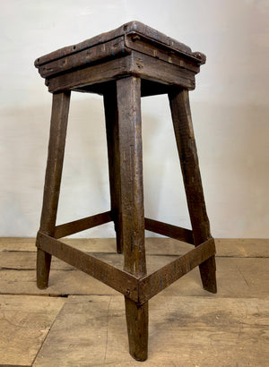 A good example of a primitive 19th century blacksmith's stool from the Cambridgeshire Fens