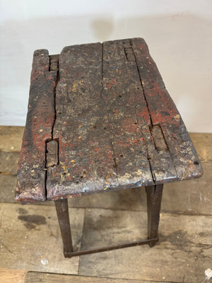 A good example of a primitive 19th century blacksmith's stool from the Cambridgeshire Fens