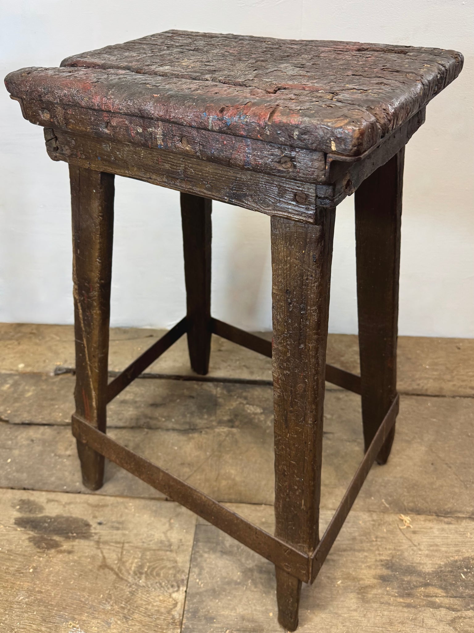 A good example of a primitive 19th century blacksmith's stool from the Cambridgeshire Fens