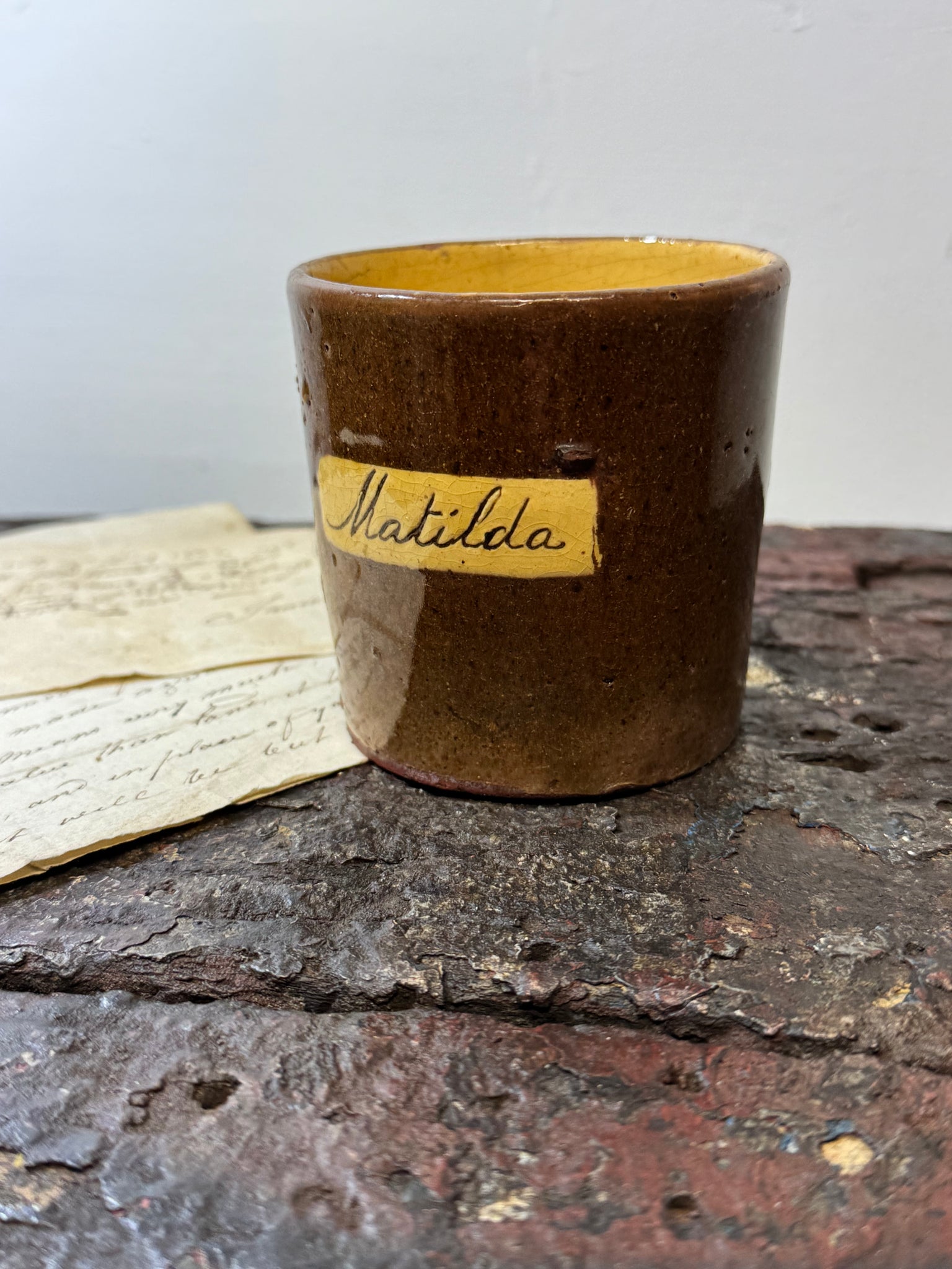 A slipware mug  for 'Matilda'  by Isaac Button of Soil Hill, Halifax