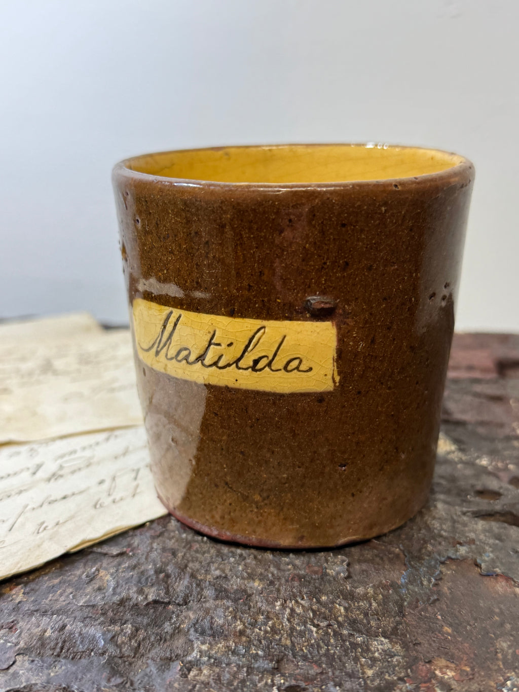 A slipware mug  for 'Matilda'  by Isaac Button of Soil Hill, Halifax