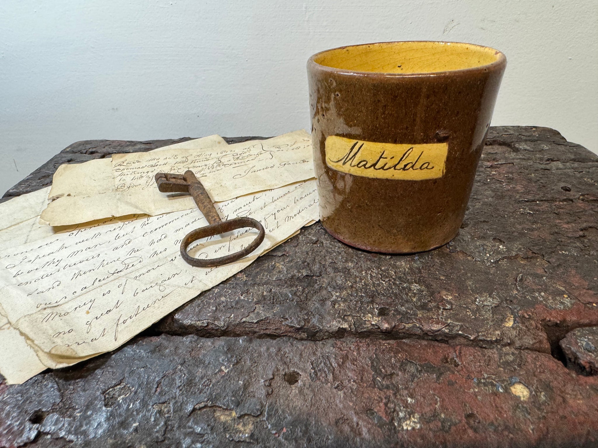 A slipware mug  for 'Matilda'  by Isaac Button of Soil Hill, Halifax